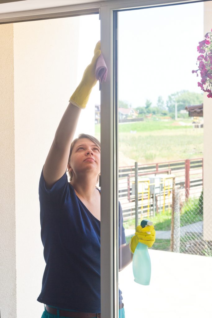 Young girl washing sunroom